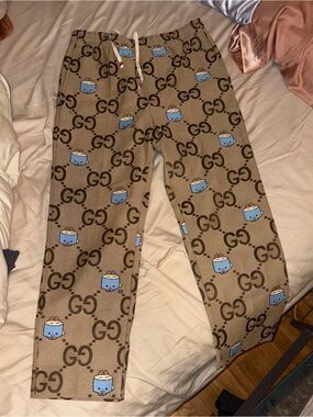 Gucci Logo Print Canvas Beige Lounge Pants with Blue Cartoon Motif
